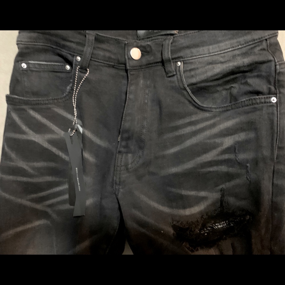 Amiri Cut Style Jeans